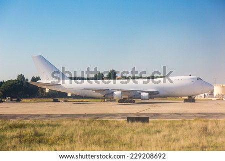 Big Cargo Airplane at Airport Parking Area