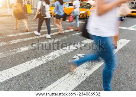 People Walking on Zebra Crossing