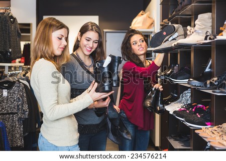 Women Buying Shoes in a Store