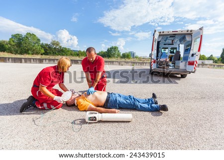Rescue Team Providing First Aid