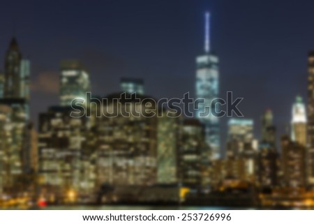 Skyscrapers in New York Downtown at Night. Blurred Background.