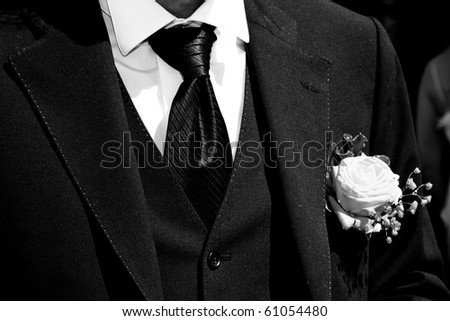 stock photo Groom with Tuxedo and Wedding Flower