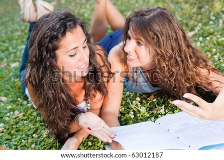 Two Young Woman Study Togheter at Park