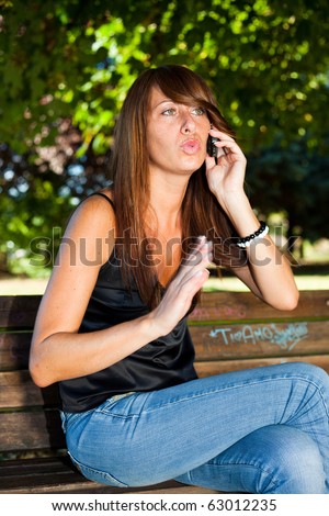 Young Angry Woman Talk on the Phone