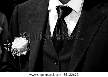 stock photo Groom with Tuxedo and Wedding Flower