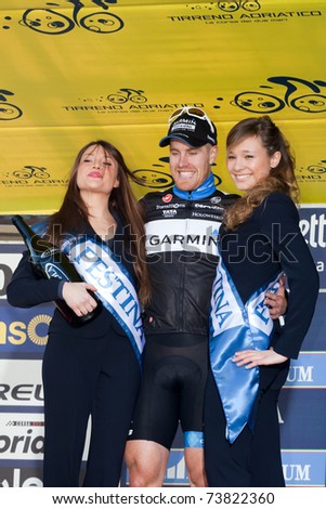 INDICATORE, AREZZO, ITALY - MARCH 10: Tyler Farrar of Team Garmin Cervelo awarded as Winner after the the 2nd stage of 2011 Tirreno-Adriatico on March 10, 2011 in Indicatore, Arezzo, Italy