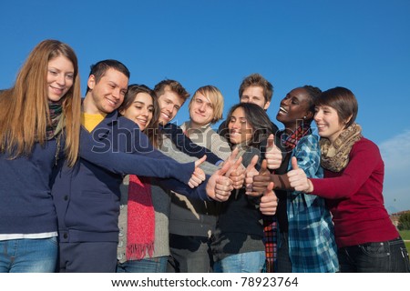 Happy College Students with Thumbs Up
