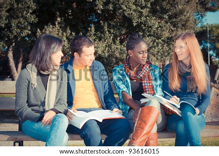 College Students Studying Together at Park