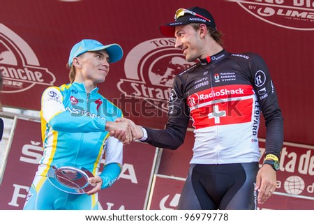 SIENA, ITALY - MARCH 03: Fabian Cancellara and Maxim Iglinskiy on the podium of Strade Bianche 2012, on March 03, 2012 in Siena, Italy