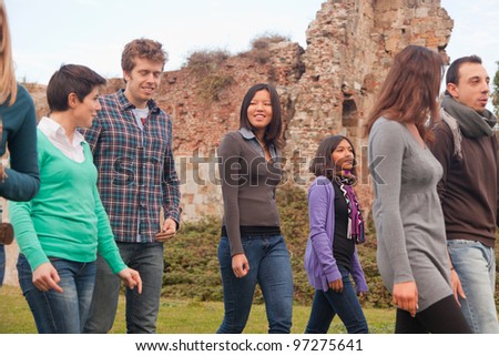 Multicultural Group of People Walking Together