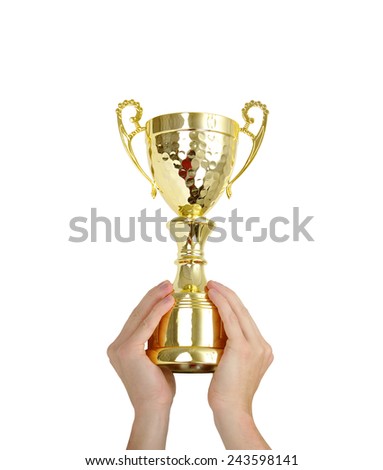 Man holding a champion golden trophy on white background