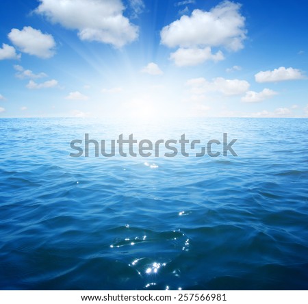 Blue sea and sun on sky