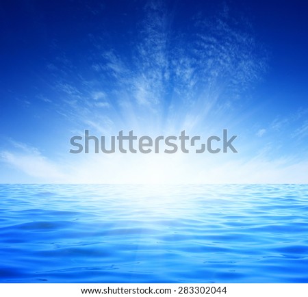 Blue sea and sun on sky