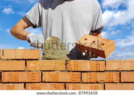 bricklayer on sky