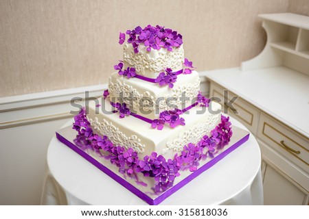 Big wedding cake before ceremony