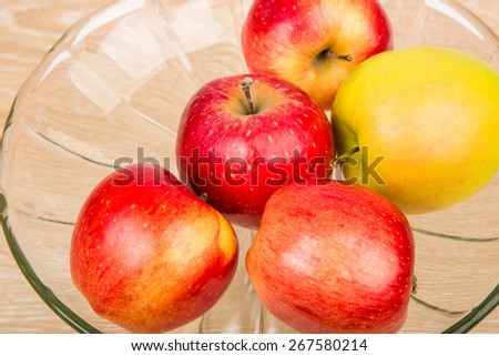 apples in a vase on a white background