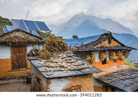 Nepali traditional houses with solar cell panel on the roof. Muri village, Dhaulagiri region.