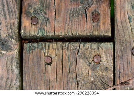 Old Wood and Nails After the Rain (the rain made the wood grain vivid)