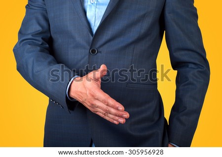 businessman extending hand to shake isolated
