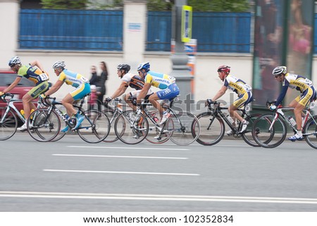 MOSCOW - MAY 9, 2012: Unidentified cyclists during the last stage of \