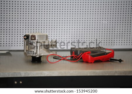 Generator and electric tester on a workbench