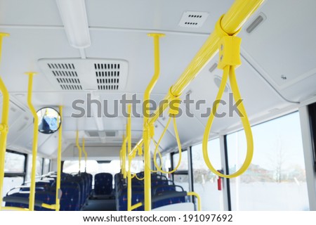 Handles for standing passenger inside a bus