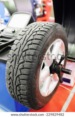 image of tyre fitting machine under the white background