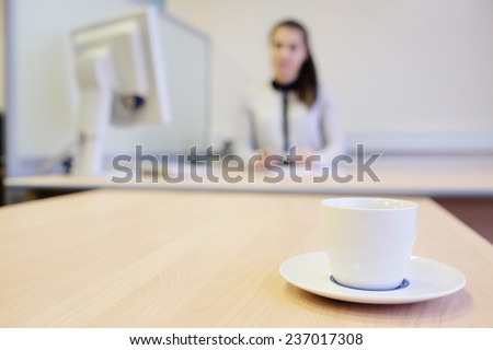 Girl secretary in an office