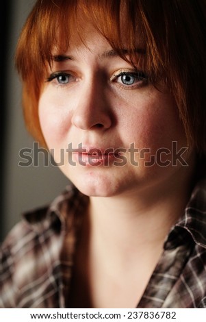 close-up portrait of confused woman