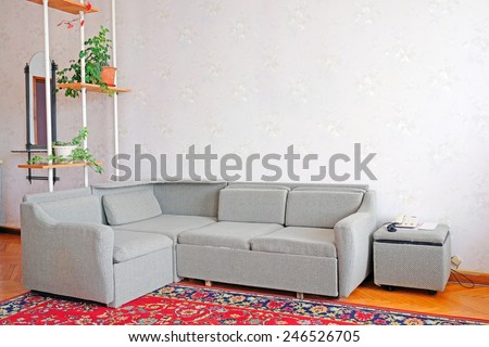 Corner sofa in a motel room