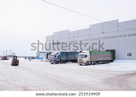 Tver region, Russia, February, 06,2015: trucks are loaded at the warehouse