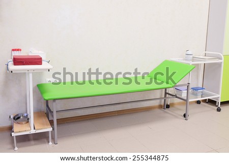 Patient examination table in a doctors office