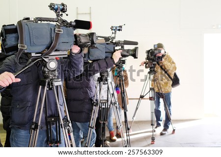 Journalists from different of channels taking an interview