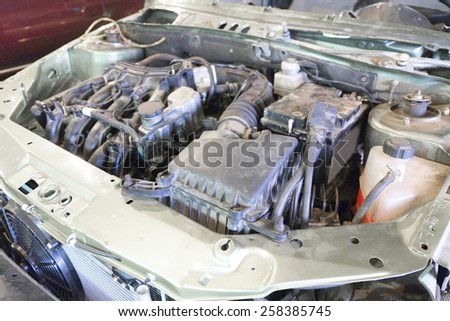 Under the hood of the car. Car is prepared for repair
