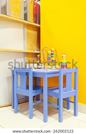 Small blue table and two chairs for little kids