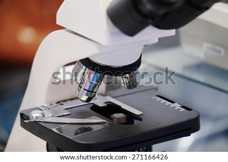Image of the professional medical laboratory microscope. Scientific microscope lens.