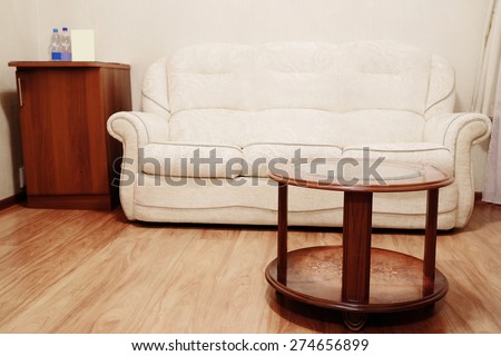 Beige sofa and coffee table