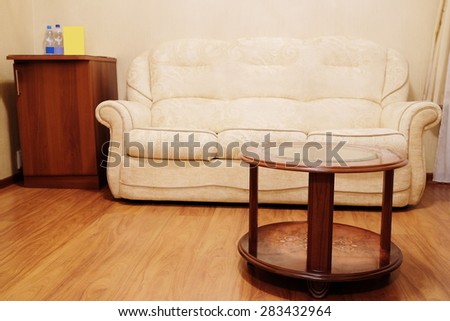Beige sofa and coffee table