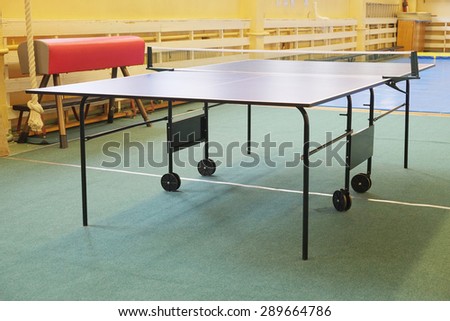 Ping-pong table in a sport hall