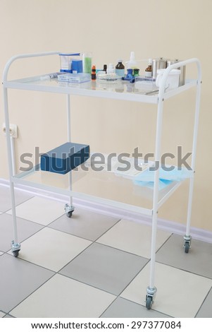 Mobile little table with medical accessories