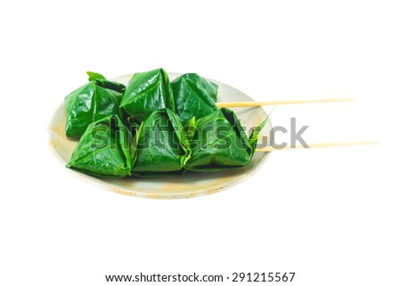 Food wrapped in leaves isolated