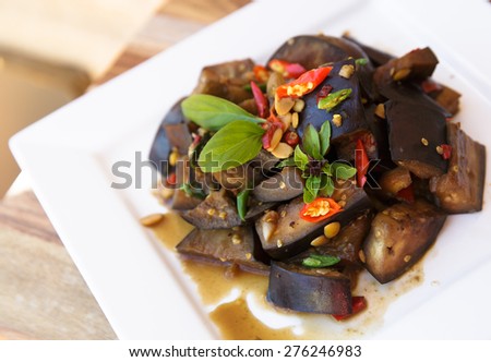 Vegetarian food Thai Style Eggplant Stir-Fry with Bean paste and chillli, Thai basil