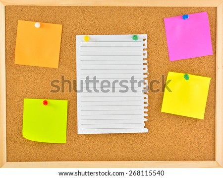 Stick note. Blank notes pinned on corkboard