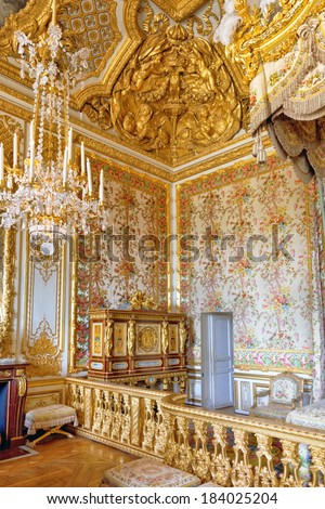 VERSAILLES FRANCE - SEPTEMBER 21 Interior of Queen\'s bedroom Royal Versailles, France on september 21, 2013. Palace Versailles was a Royal Chateau-most beautiful palace in France and word.