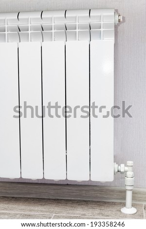 Heating white radiator radiator in living room.