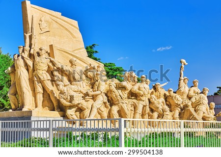 Commemorating statues of workers in struggle in the revolution of China located near  mausoleum of Mao Zedong, Beijing. China.