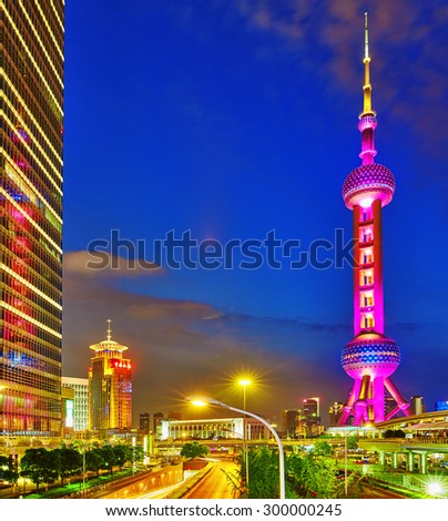 SHANGHAI-MAY 24, 2015. Oriental Pearl Tower at the nighttime. Tower  470 meter the Oriental Pearl is one of Shanghai\'s tallest buildings, located at Lujiazui finance and trade zone in Pudong
