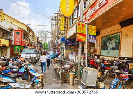 SHANGHAI, CHINA - MAY 24, 2015:Beautiful view of Shanghai street Nanjing Lu. Shanghai street Nanjing Lu has many modern malls, shops, cafes, restaurants and places for interesting spend a time.