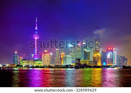 SHANGHAI, CHINA -MAY 24, 2015. Oriental Pearl Tower at the nighttime. 470 meter high the Oriental Pearl is one of Shanghai\'s tallest buildings, located at Lujiazui finance and trade zone