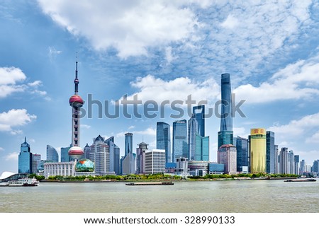 SHANGHAI, CHINA- MAY 24,  2015: Oriental Pearl Tower on  blue sky background. Tower 470 meter the Oriental Pearl is one of Shanghai\'s tallest buildings.